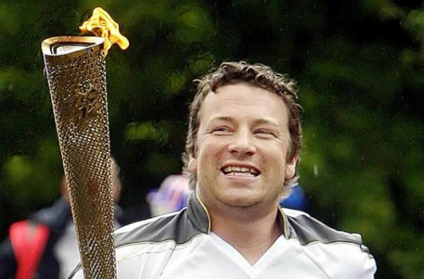 Jamie Oliver Carries Olympic Torch Through Essex