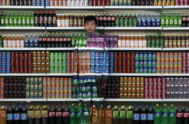 Chinese Artist Blends into Grocery Store Shelf for ‘Plasticizer'
